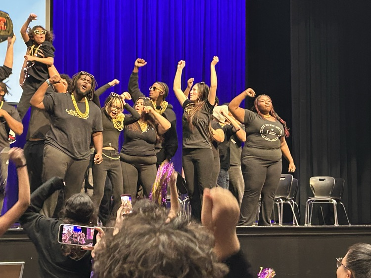 Image with Miller Theatre team celebrating their win on the Improv fundraiser battle
