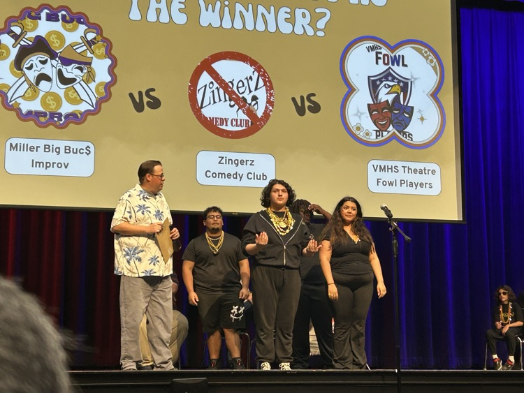 Miller team captains with host for the Improv battle
