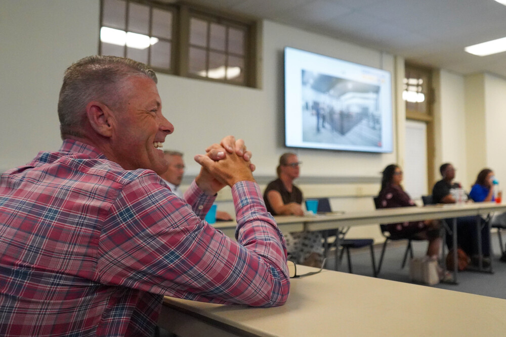 Eric Talley smiles at the bon oversight committee meeting