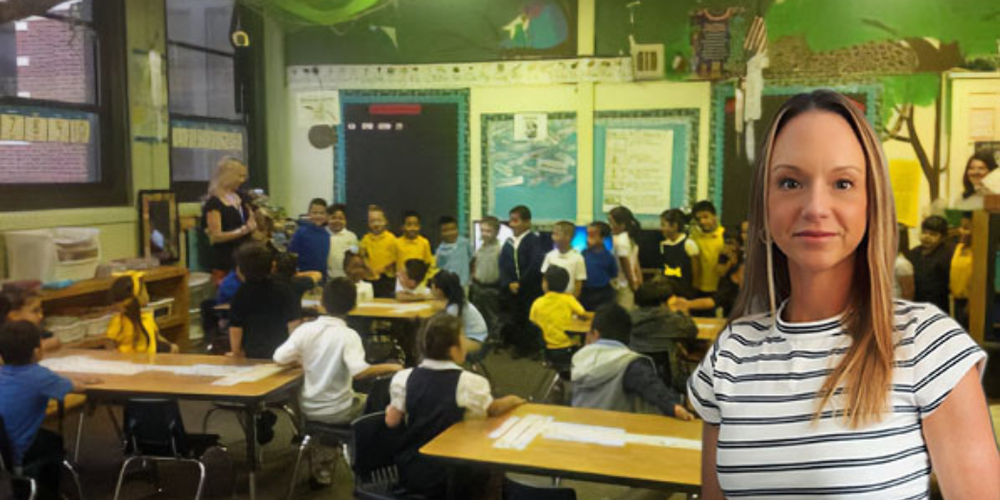 Students gathered in a colorful classroom while an adult addresses the group,  at the front is Gillian Morrison