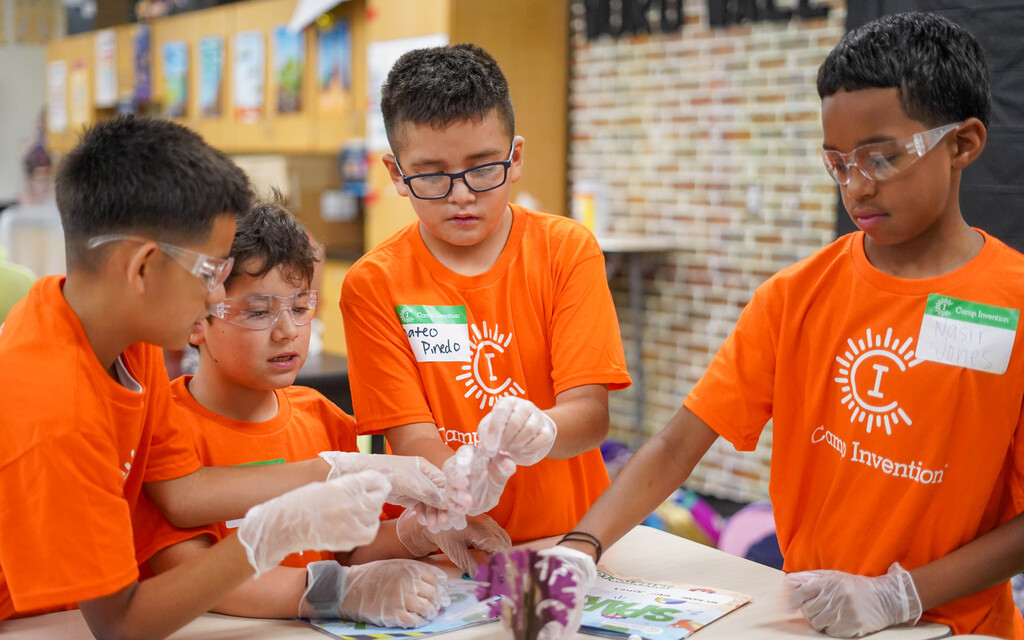 Students work on a project at science camp