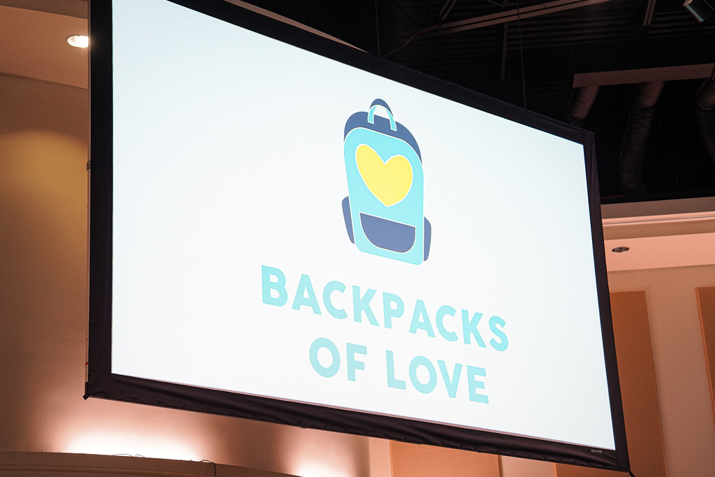 picture of video board promoting Back[acks of Love