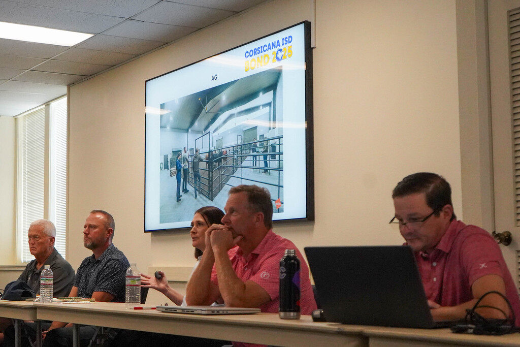 Photos of bond oversight committee members at a meeting Sept. 22, 2026