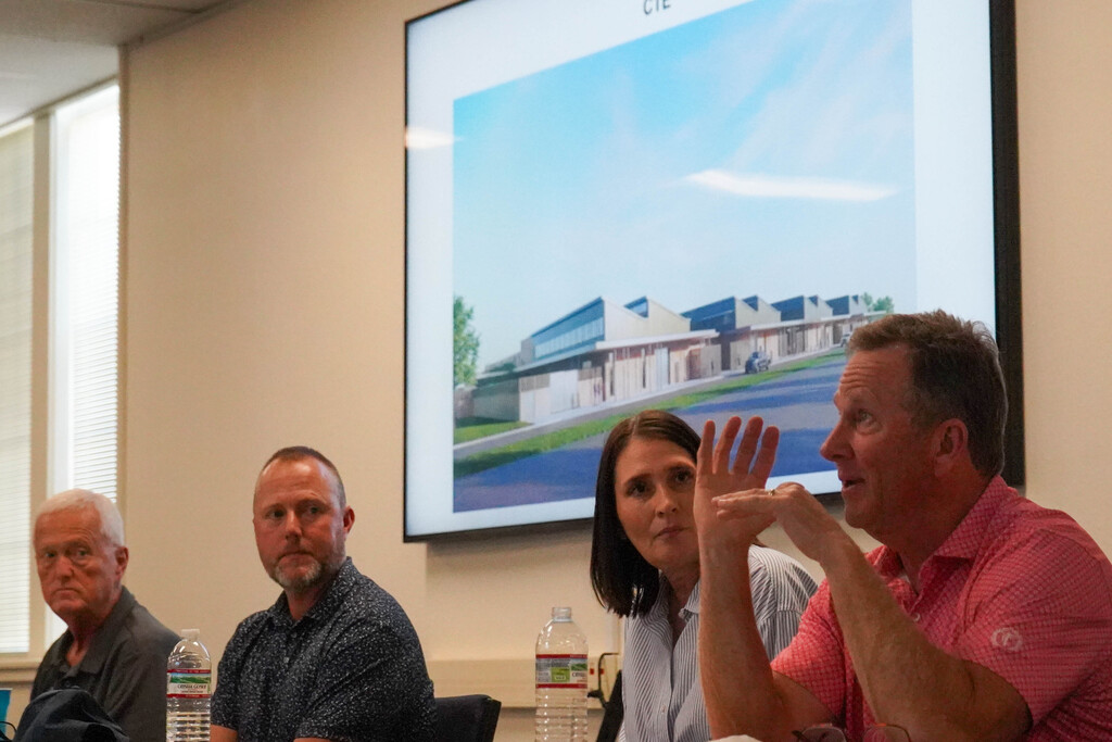 Photos of bond oversight committee members at a meeting Sept. 22, 2026
