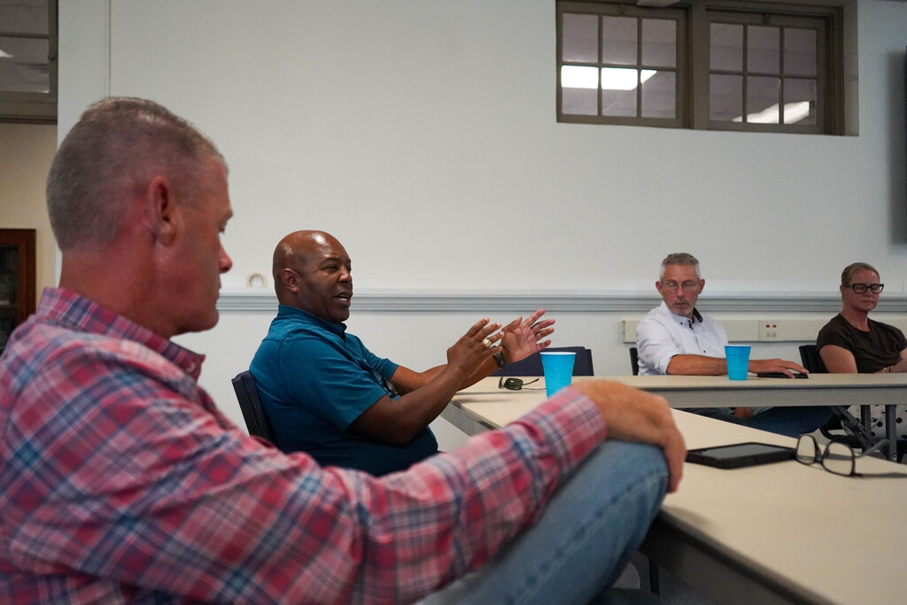 Photos of bond oversight committee members at a meeting Sept. 22, 2026