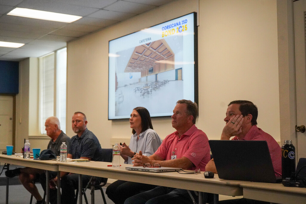 Photos of bond oversight committee members at a meeting Sept. 22, 2026