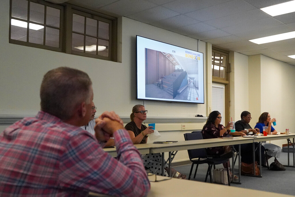 Photos of bond oversight committee members at a meeting Sept. 22, 2026