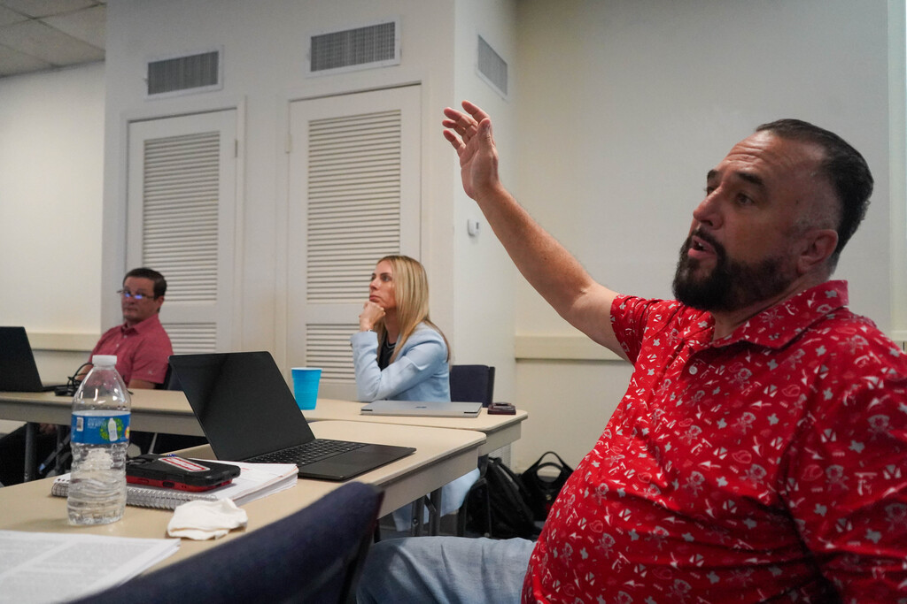 Photos of bond oversight committee members at a meeting Sept. 22, 2026