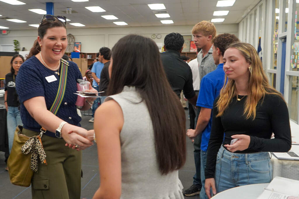Corsicana High School Honors Economics students set up shop in the library with mock business plans, financial projections, and product samples