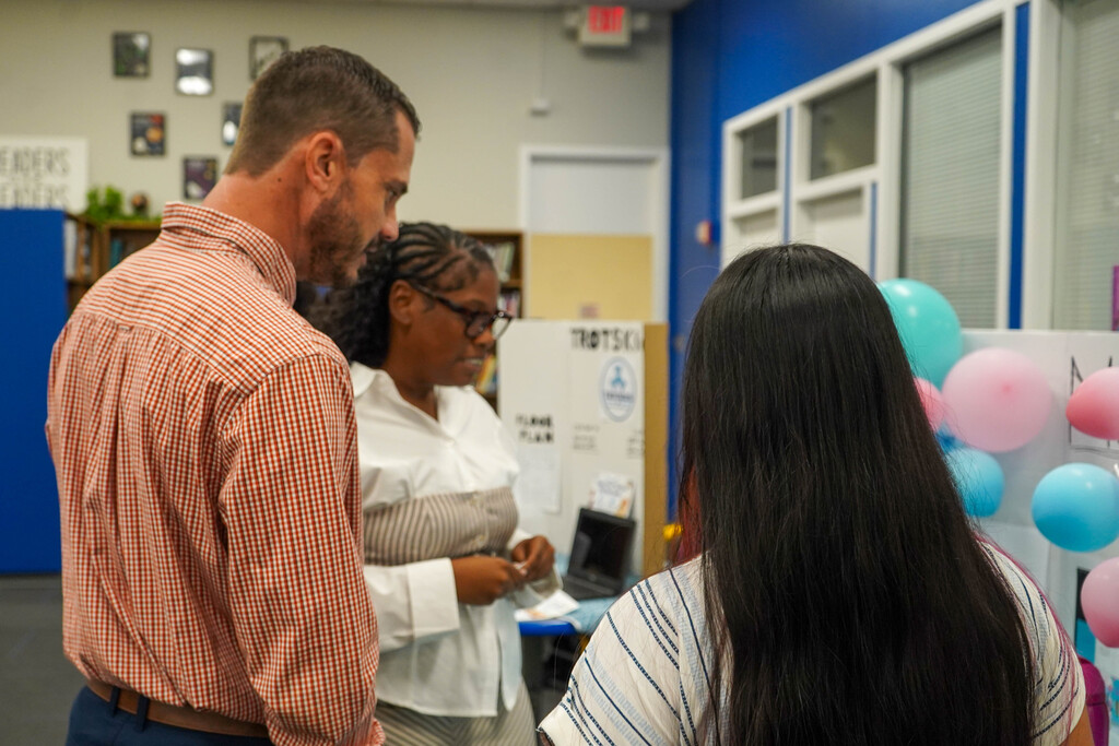 Corsicana High School Honors Economics students set up shop in the library with mock business plans, financial projections, and product samples