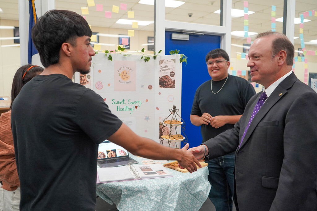 Corsicana High School Honors Economics students set up shop in the library with mock business plans, financial projections, and product samples