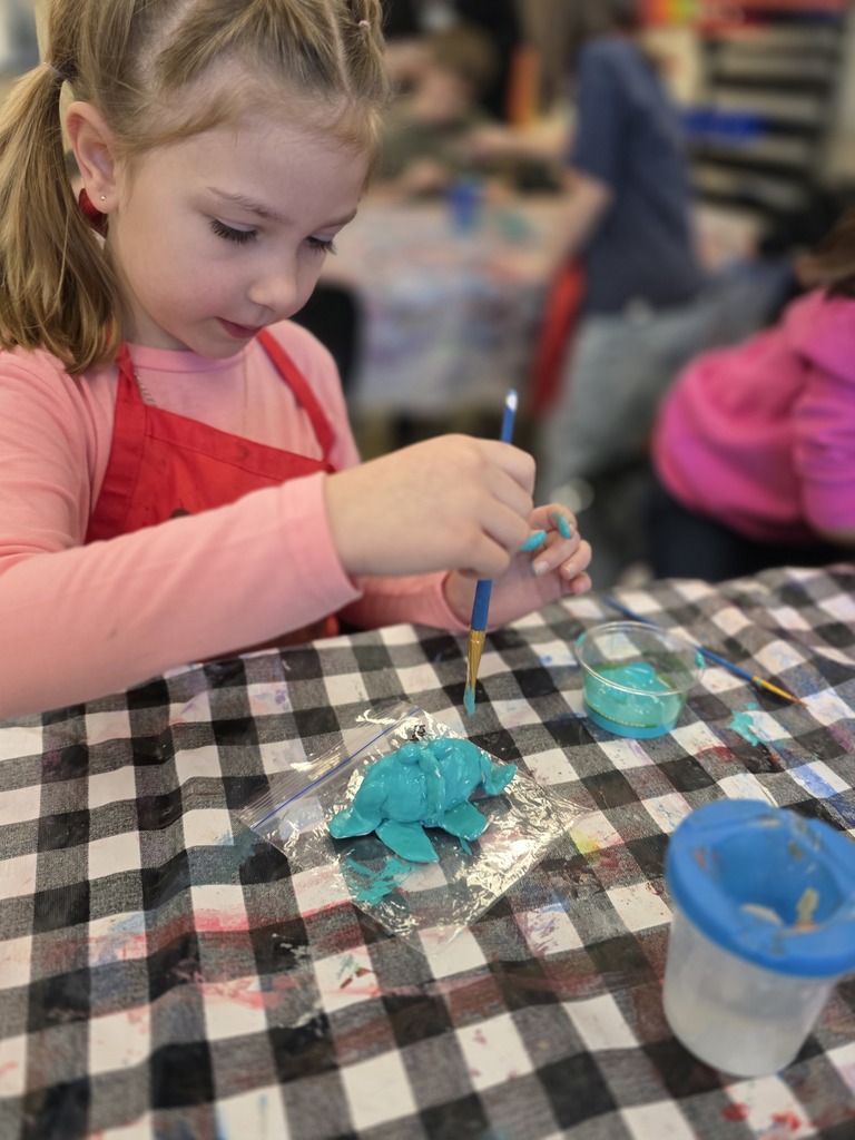 Student doing art at Elsa Meyer