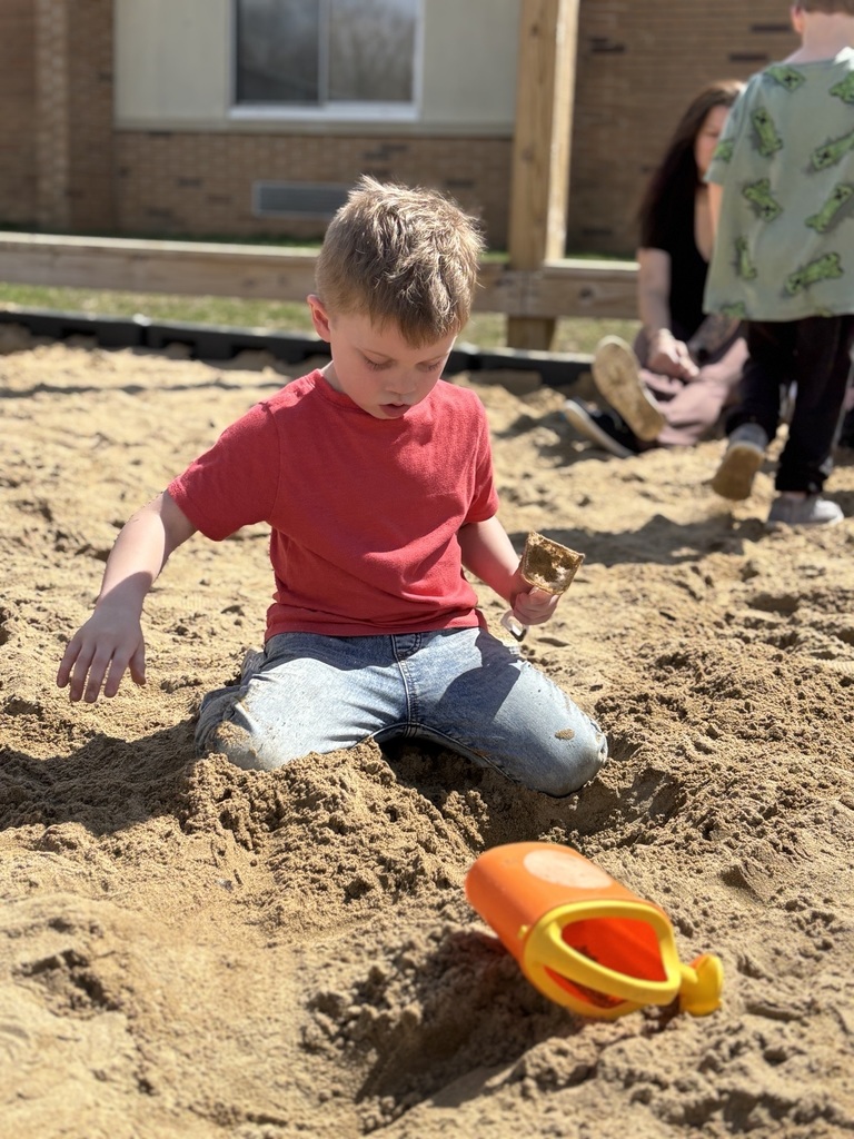 playing in the sand