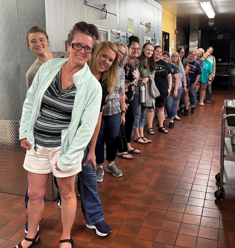 cooks standing in a line