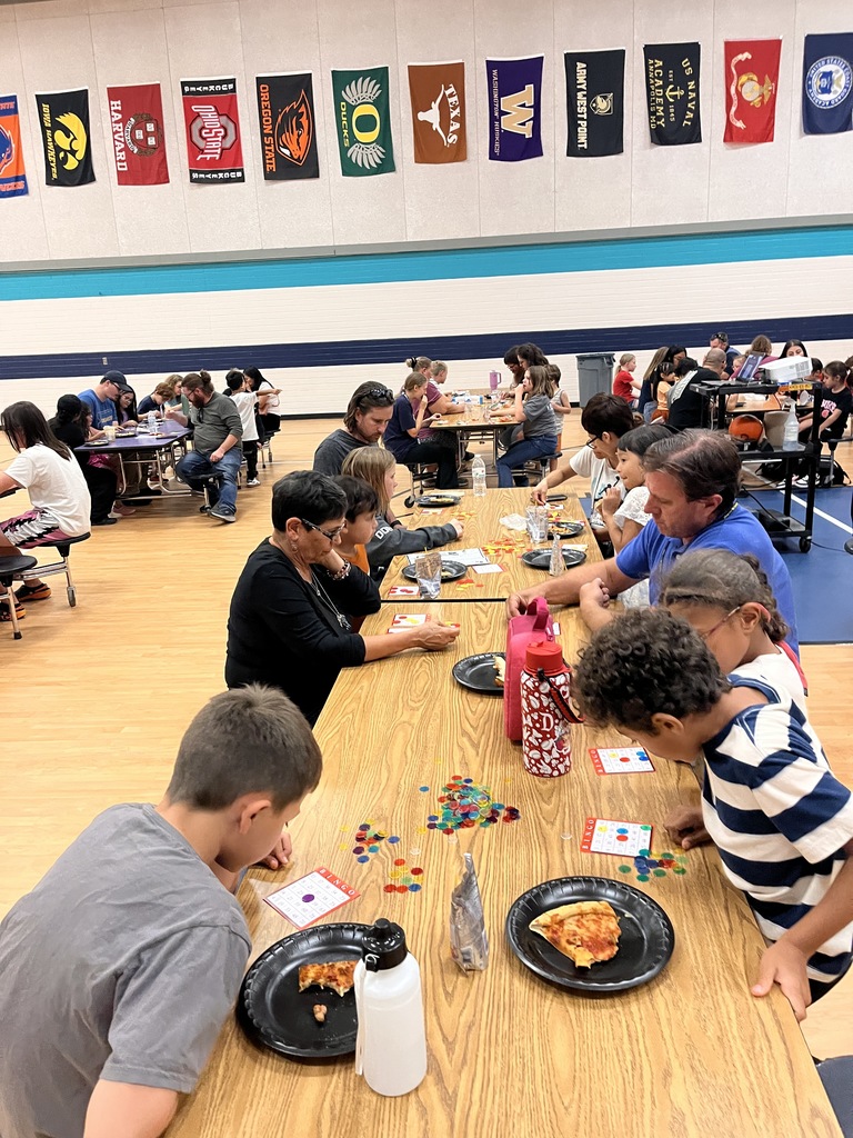Eating pizza and chatting at Bingo Night