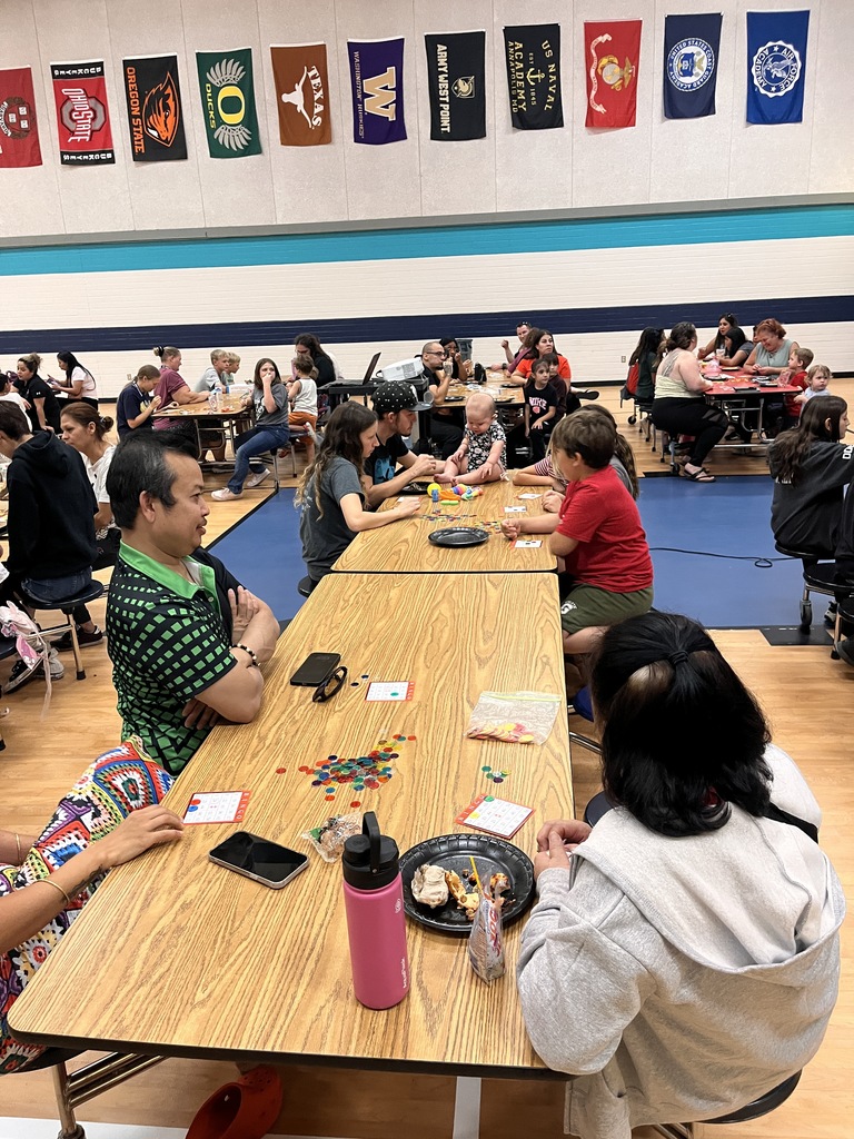 Eating pizza and chatting at Bingo Night