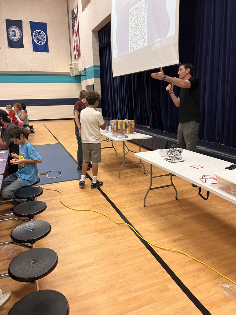 Mr. Schneider speaking at Bingo Night