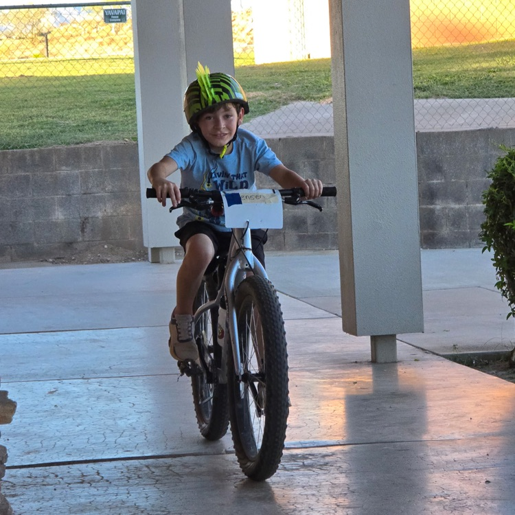 child riding bike