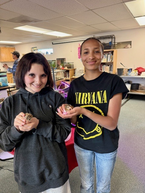 Students with guinea fowl.