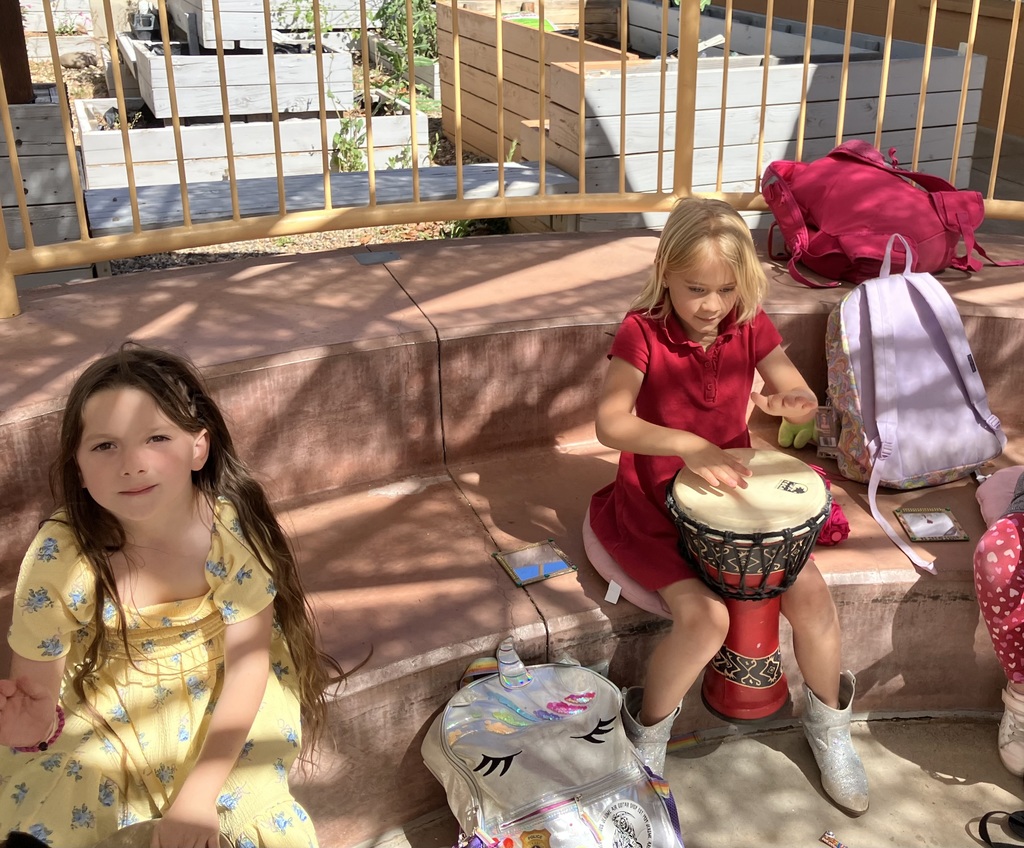 after school club kids playing bongo
