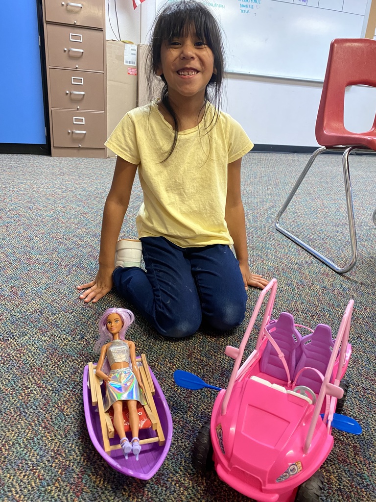 Student with her Barbie. The student named her Barbie Cupcake