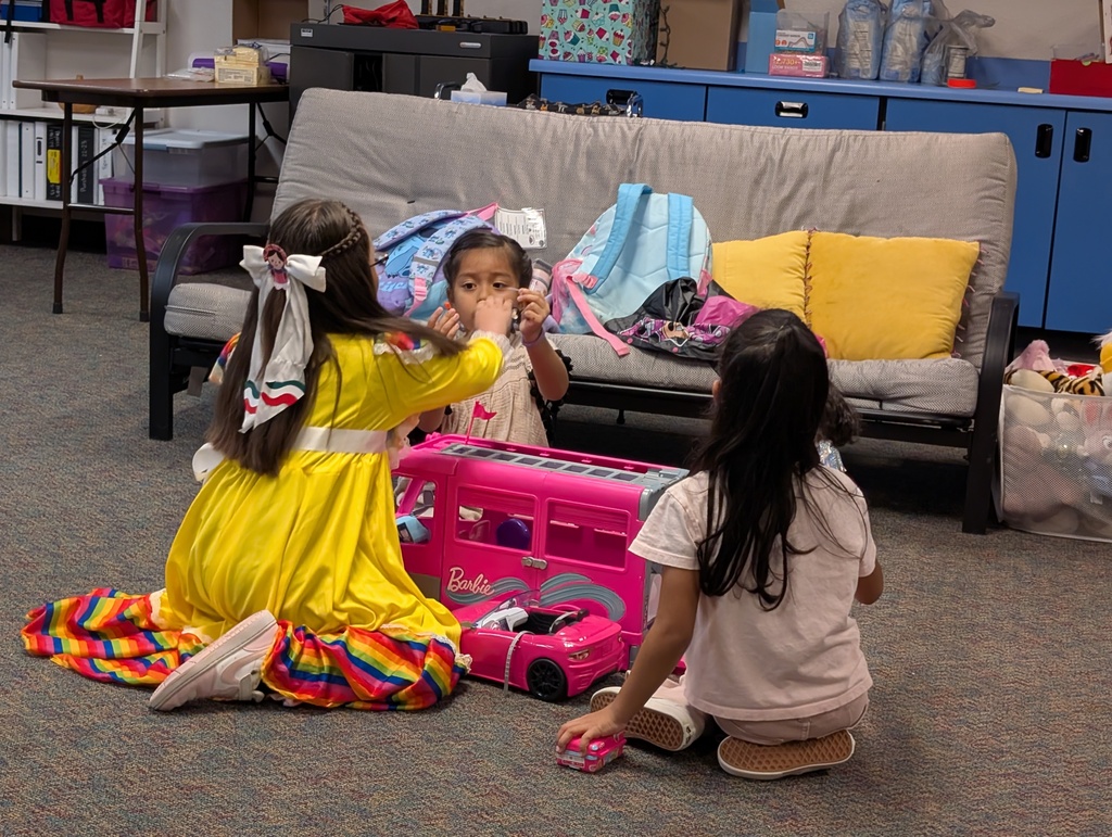 Students playing together with their Barbies.
