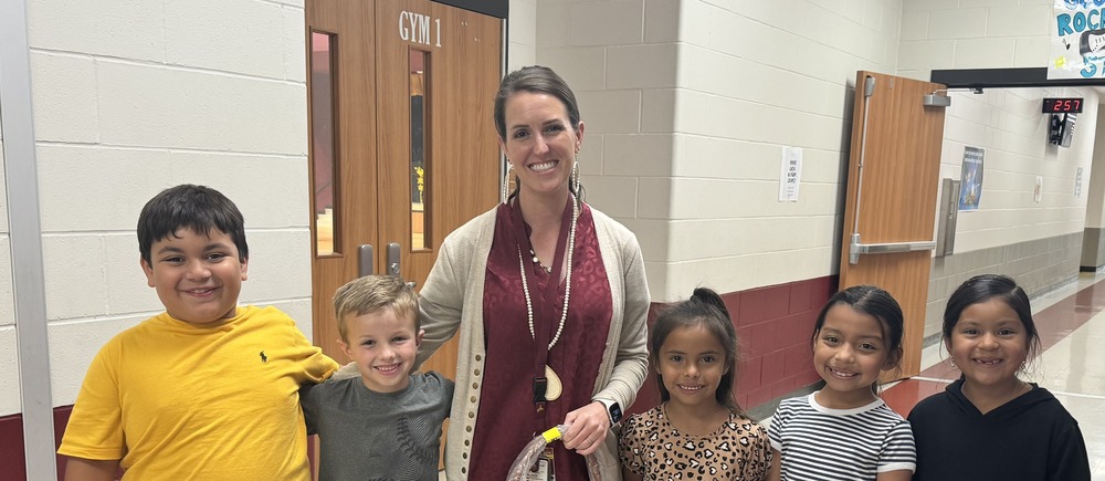 Mrs. Johnson with students
