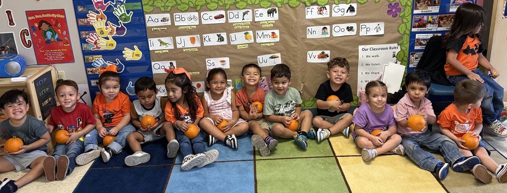 Toddler 2 with Donated Pumpkins
