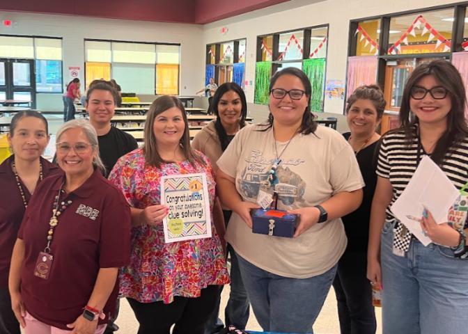 RBE Staff showing their completion of the escape room!
