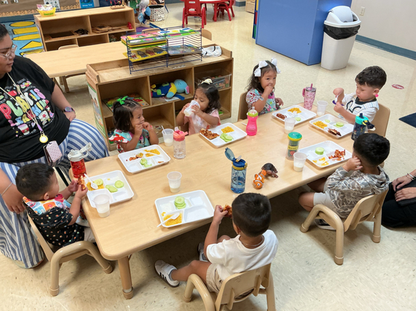 Toddler 1 eating lunch