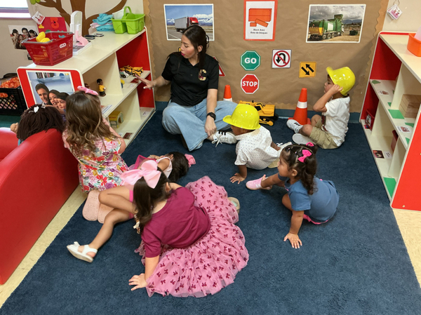 Preschool class in the block area