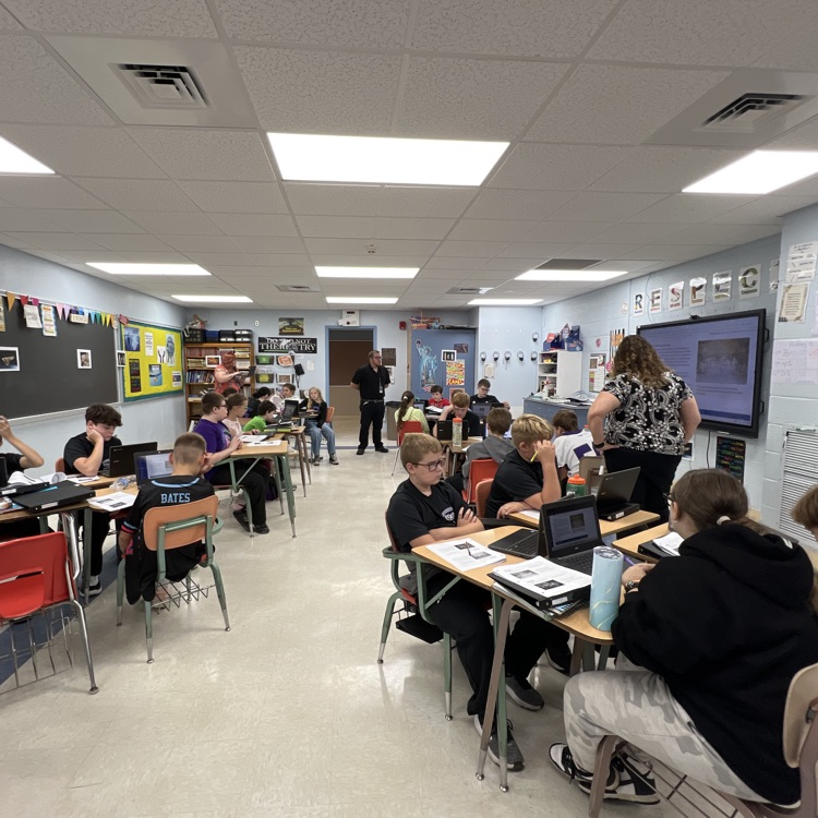 students in Mrs. Barber’s class learning about cave drawings