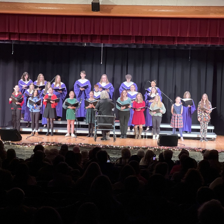 combined Choruses singing on stage 