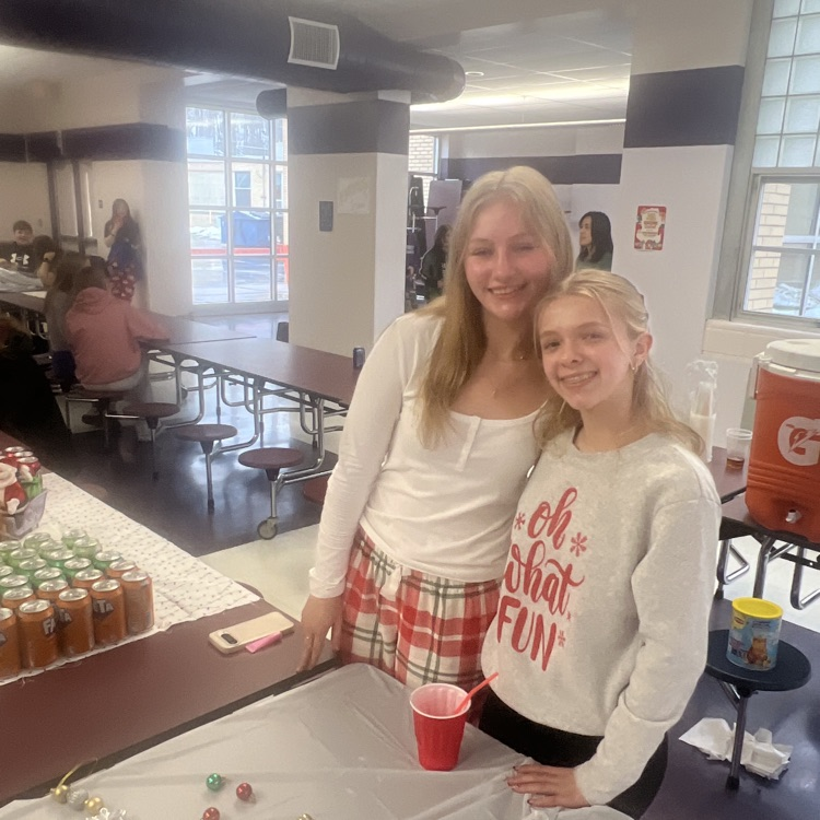 students selling items.  