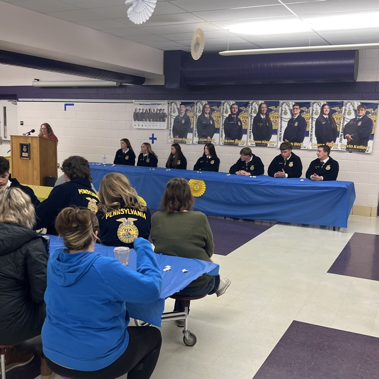 Spudgrowers FFA leadership. sitting at a table  