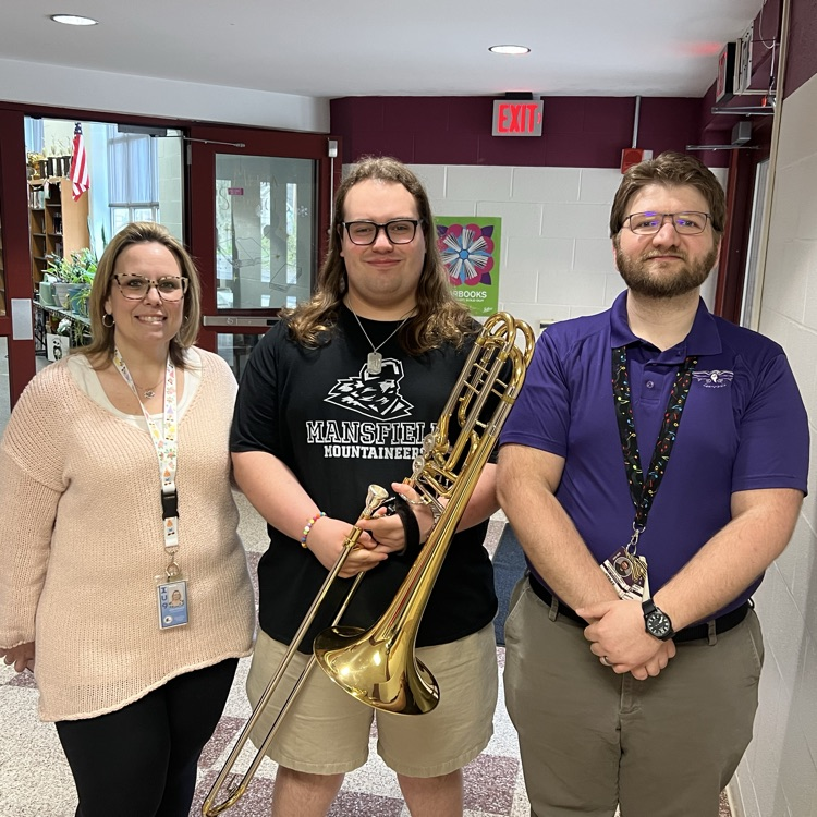 Mrs. Woodard-Furman, Ty, and Mr. Ouelette posing for a photo