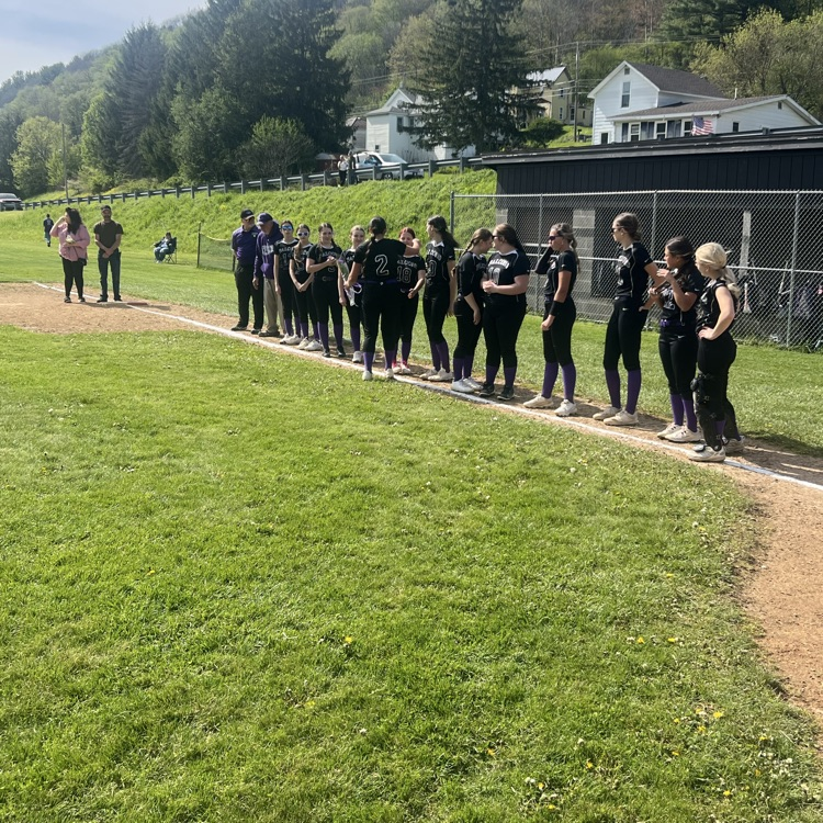 softball players in a line congratulating a sr