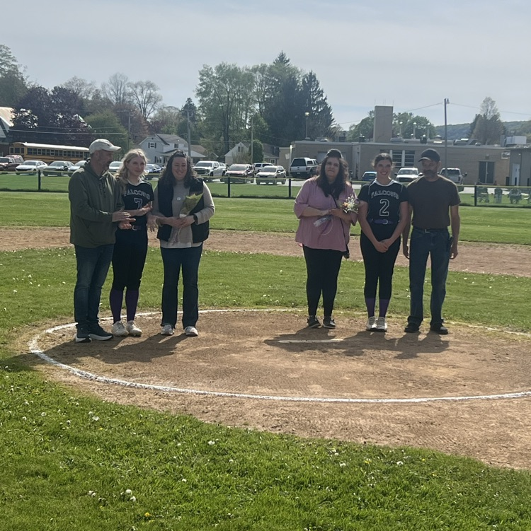 senior softball players and their families
