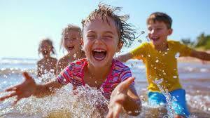 young child playing in the water