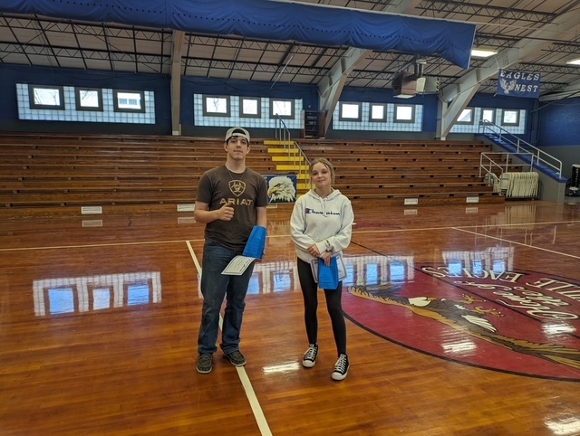 Students with their January Student of the Month awards