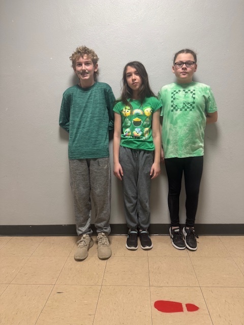 Olin, Sofia, and Kendall celebrating Green Eggs and Ham day