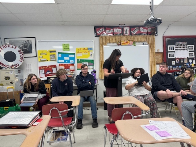 Class receiving instructions from Mrs. Dyson