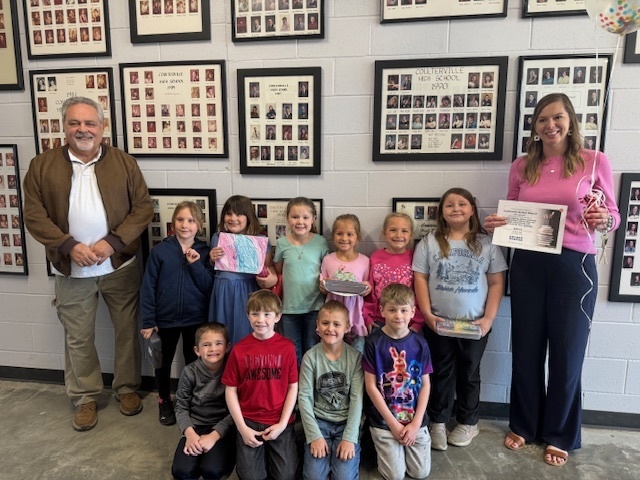 Mrs. Kolweier's class accepting her Donor's Choose award.