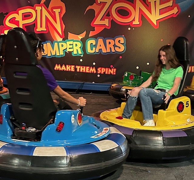 Maci and Samantha on the bumper cars