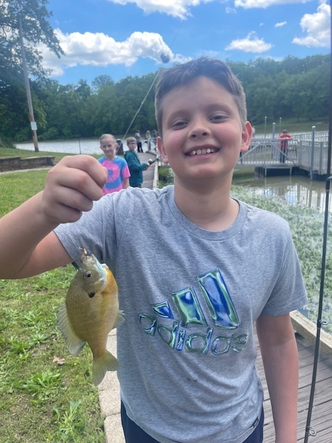 Jesse is happy he caught a fish