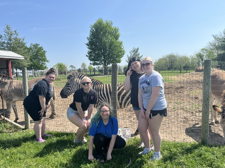 The girls with a Zebra