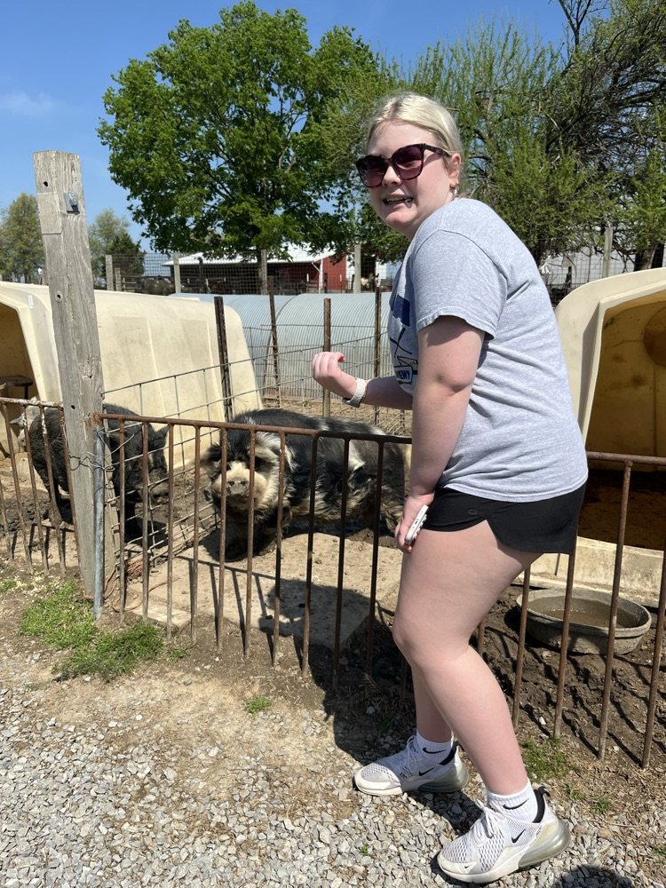 Lily with a pig