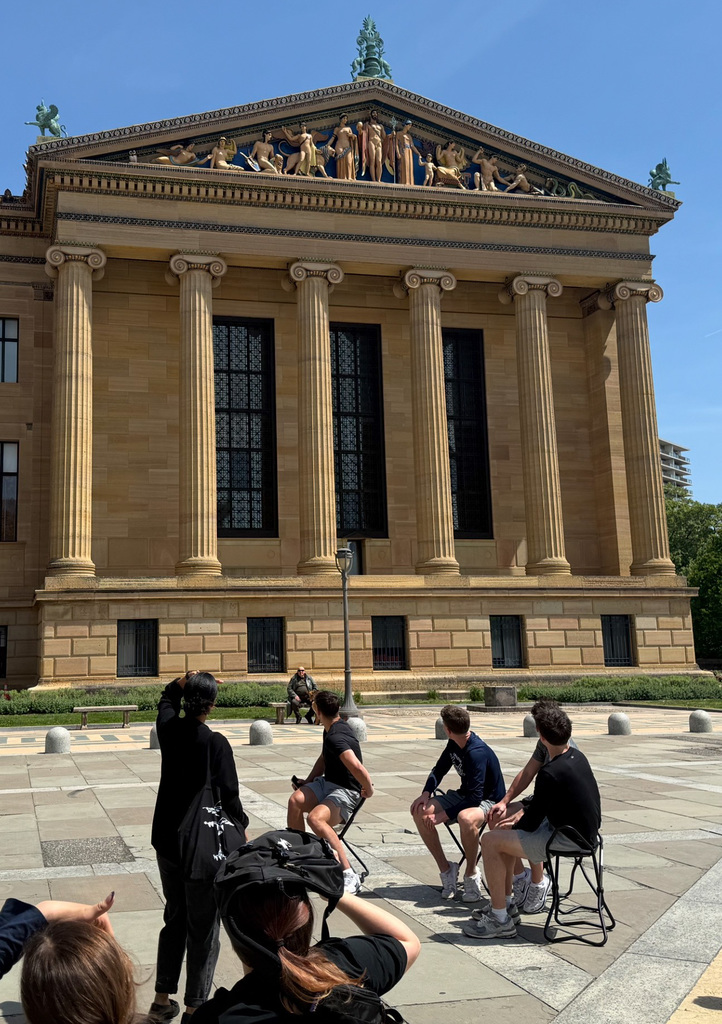 students looking at design of the art museum