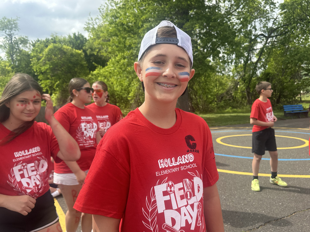 student smiling getting ready for field day