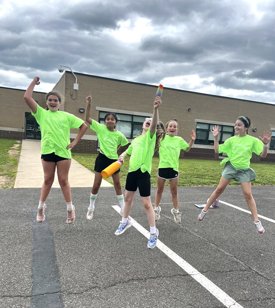 students celebrating fieldday with a popsicle